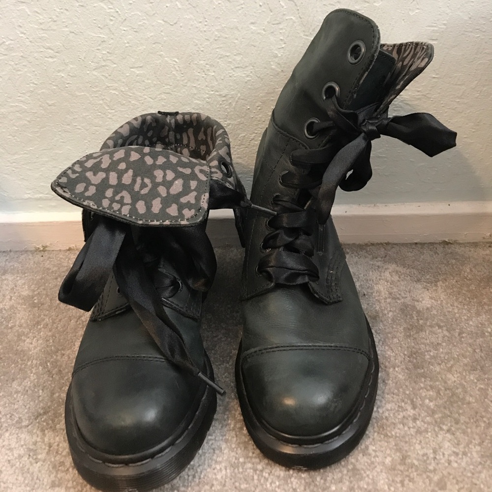 Black Dr. Martens. Can be worn folded or tall.