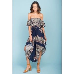 Stunning NWT off the shoulder smocked jumpsuit