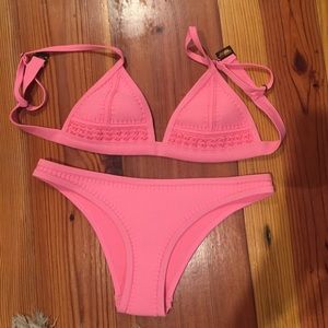 Bright pink Triangl bathing suit