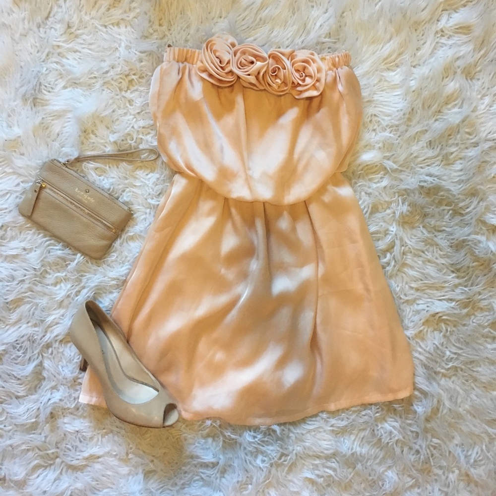 Strapless silky peach dress with rosettes