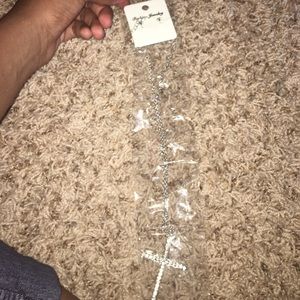 Silver cross necklace with earrings