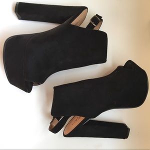 Peep toe suede heels