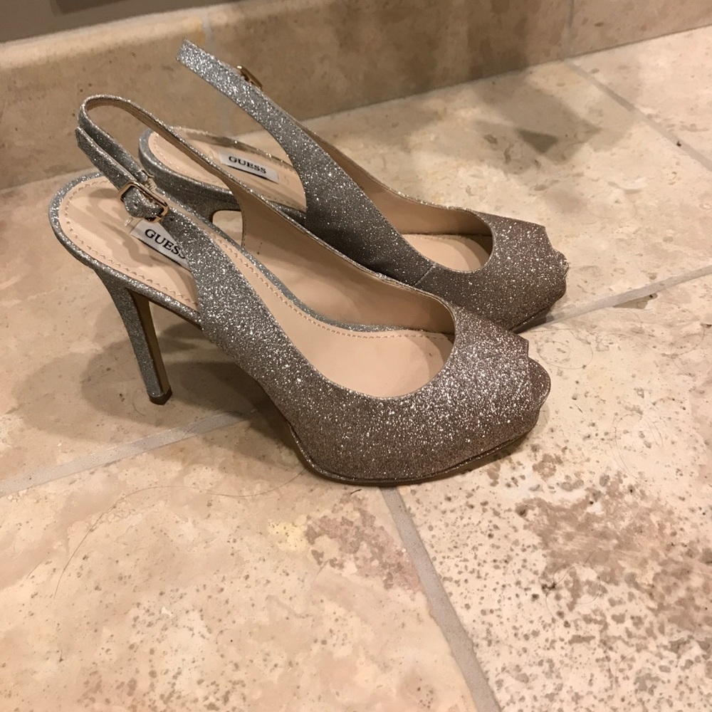Guess sling back peep toe.