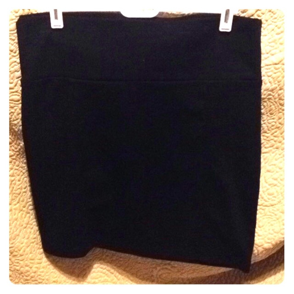 Black tight skirt. Never Worn!!