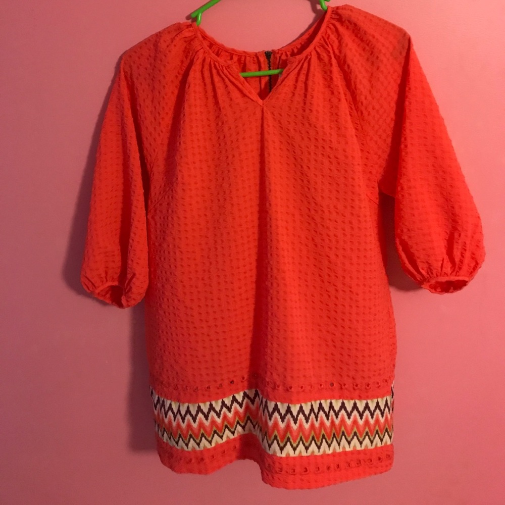 Light weight coral blouse.