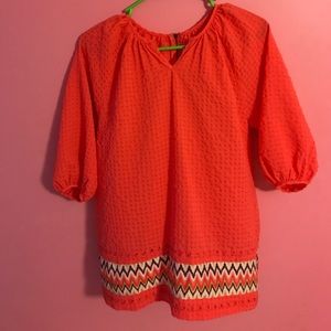 Light weight coral blouse.