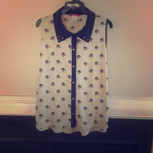 Sleeveless, skull and bones button down