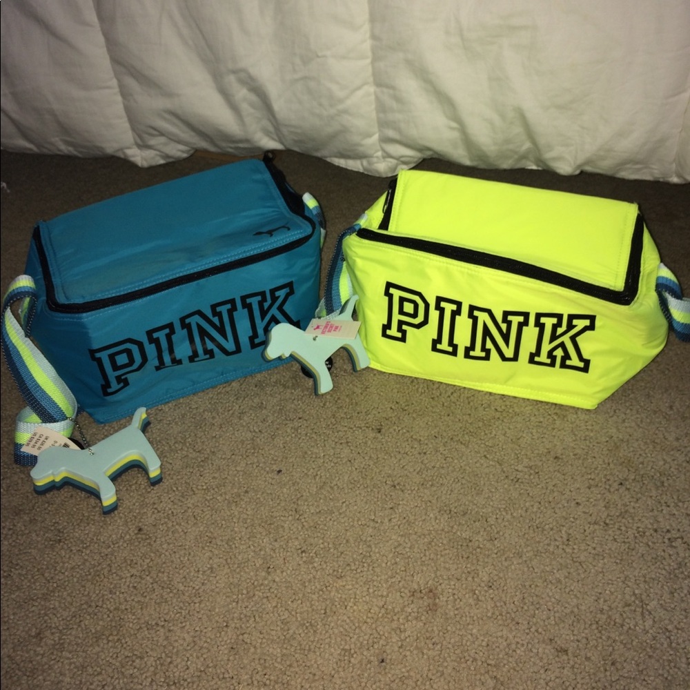 Two PINK lunch box or cooler.