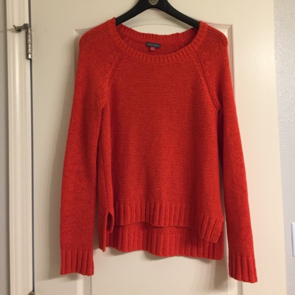 Bright orange sweater