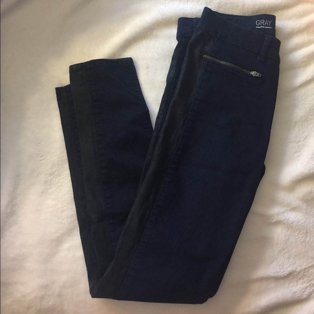 Dark wash jeans w/ black stripe and zippers