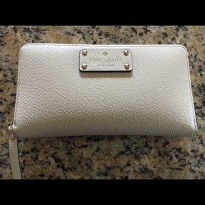 Cream Kate Spade wallet 4" wide 7.5" long