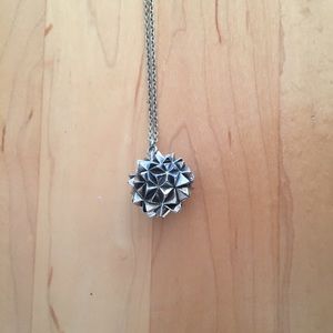 Cool spiky locket on long chain