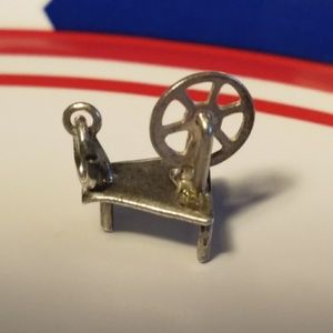 VINTAGE 1940'S STERLING SPINNING WHEEL CHARM