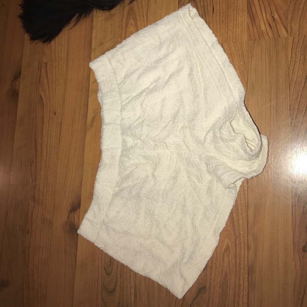 cream colored flower shorts