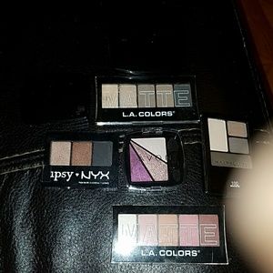 Various eyeshadow palettes and quads