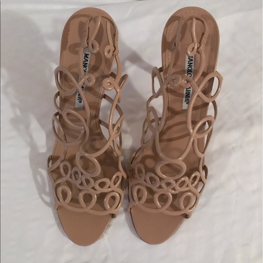 Authentic Manolo Blahnik laser cut pumps