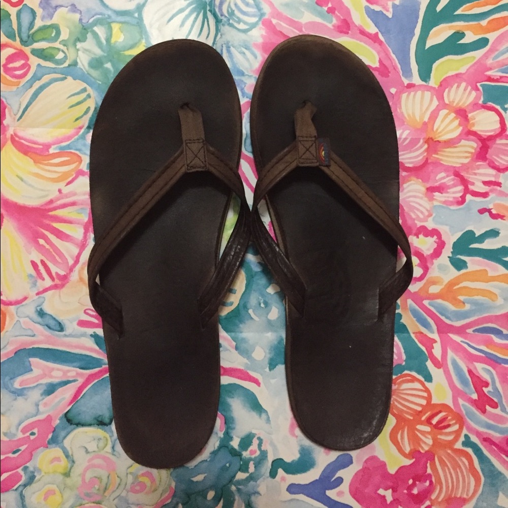 Brown rainbow flip flops