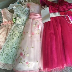 Bundle of 4 baby girl dresses.