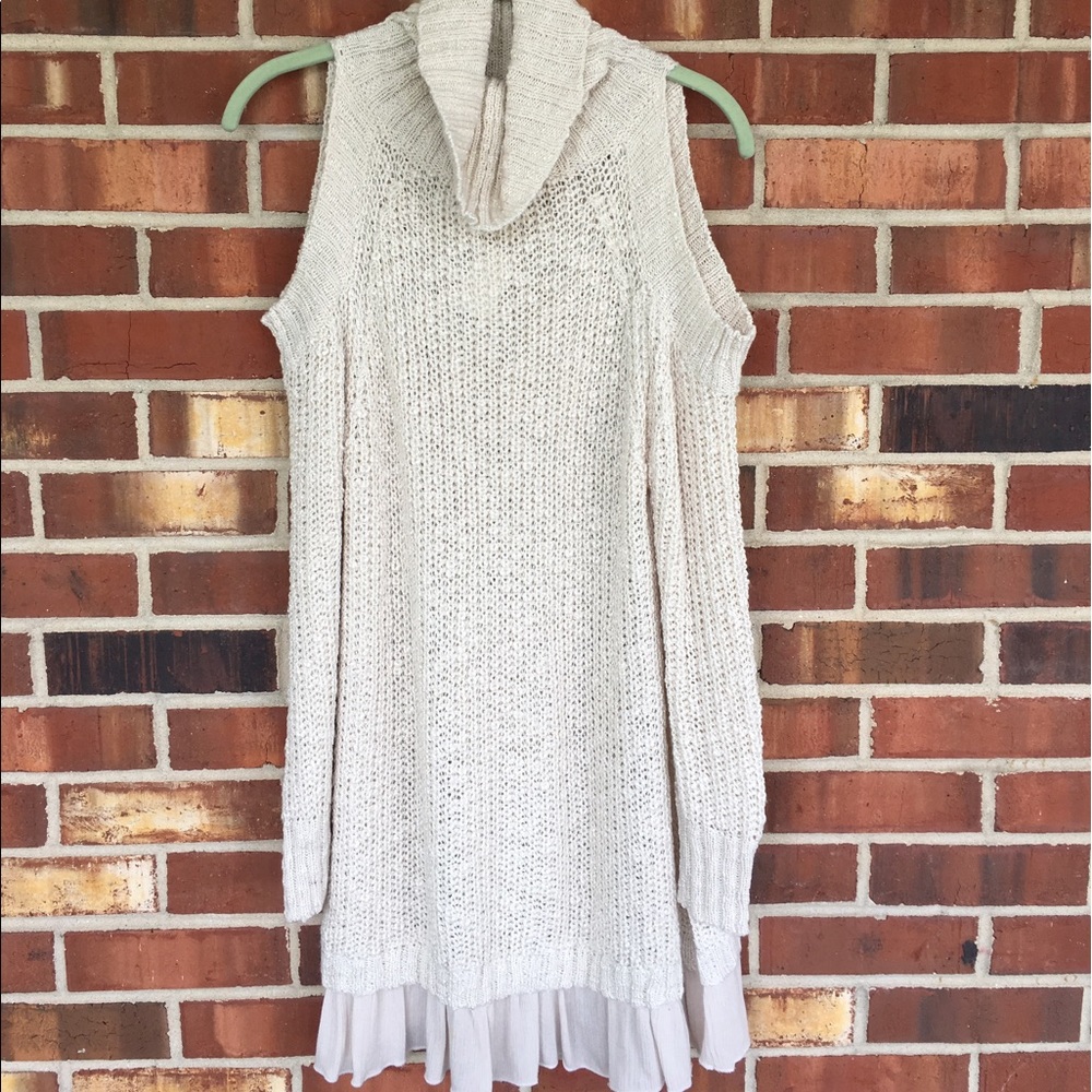 Cold shoulder - Loose knit cowl neck sweater.