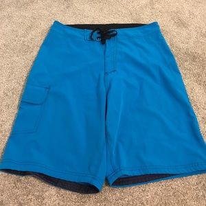 Solid blue bathing suit/ board shorts