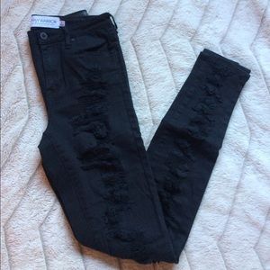 Distressed black denim