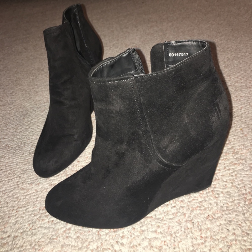 black wedged boots. Black size 8
