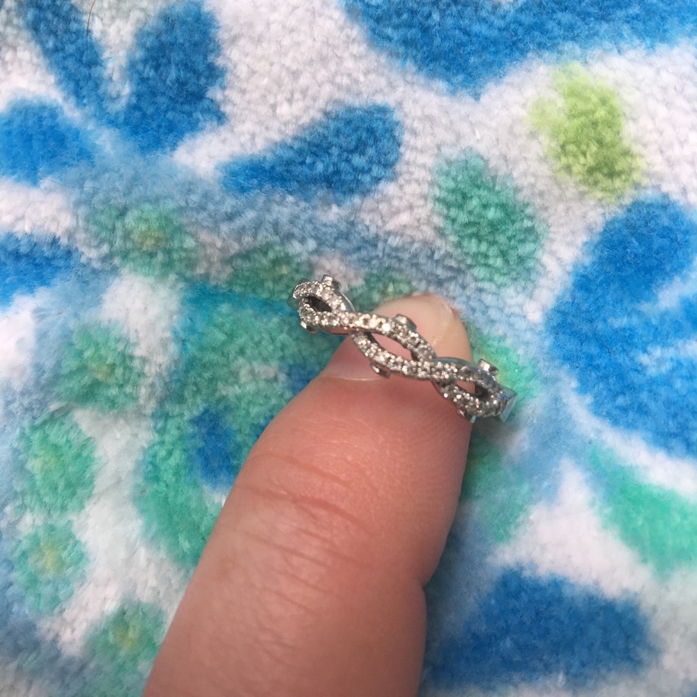 White gold and diamond wedding ring size 7.