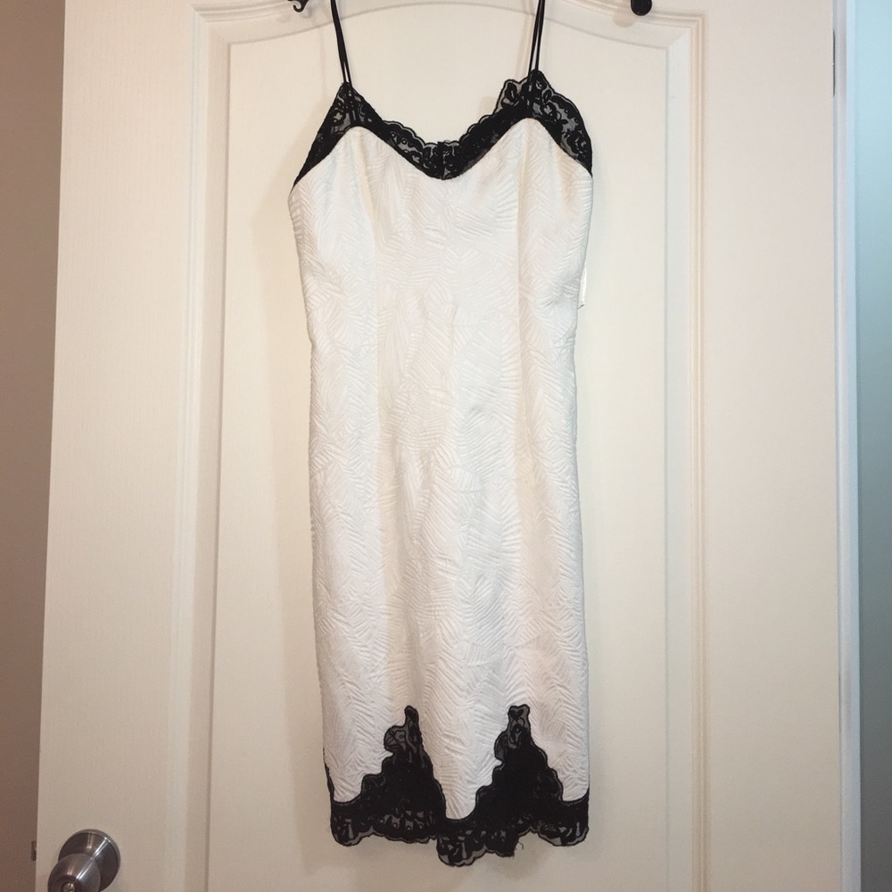 Lace trim white mini dress with spaghetti straps