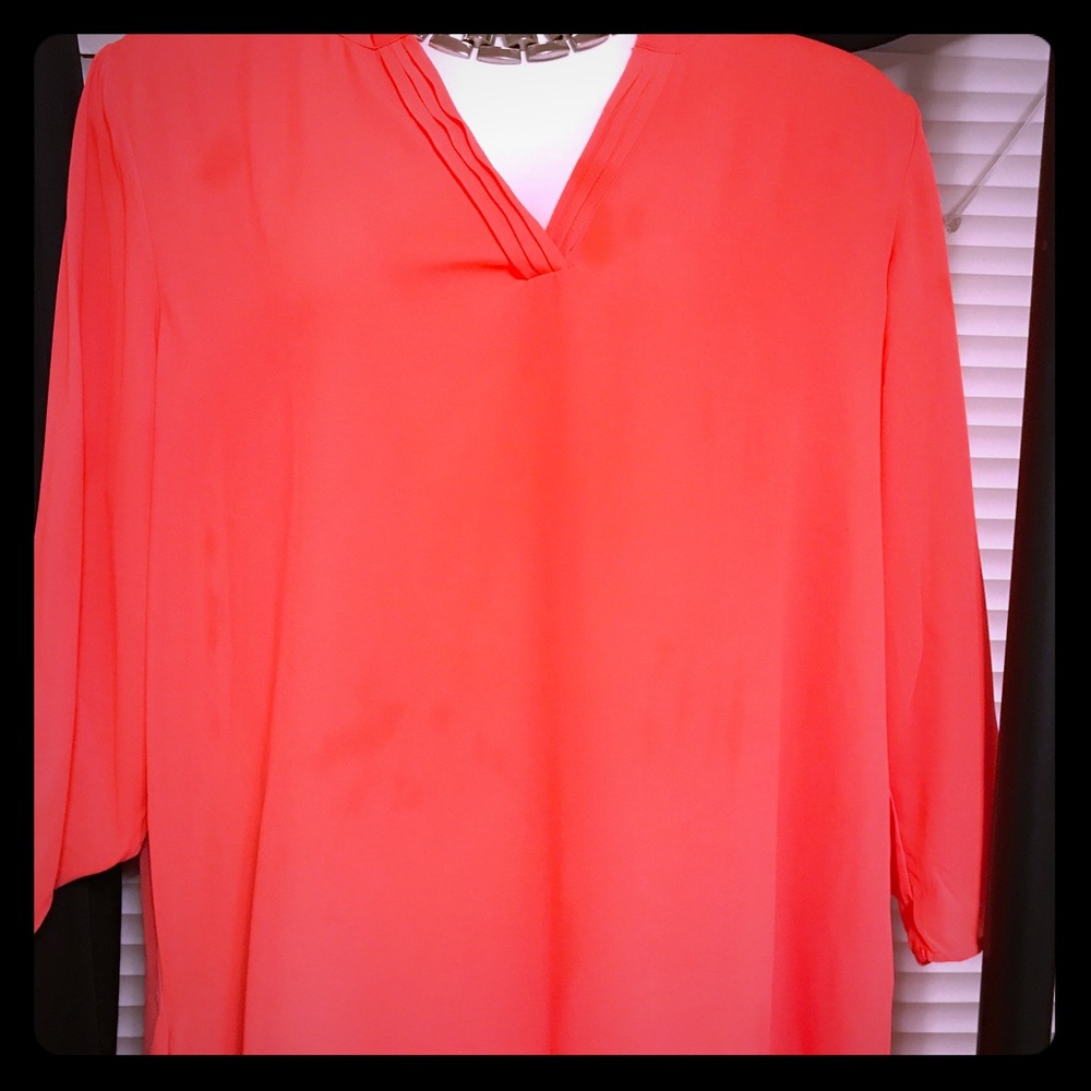 Pretty bright orange shirt