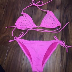 Pink string bikini set with gold accents