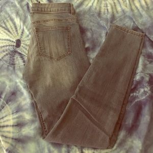 Skinny light blue jeans.