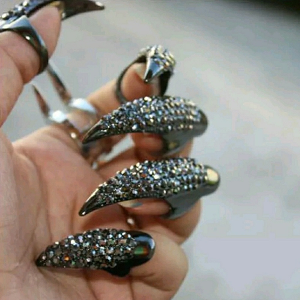 Diamond studded claw nail rings