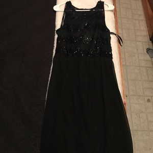 A black dress with sparkles