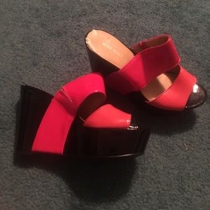 Orange,red and black Nine West wedges
