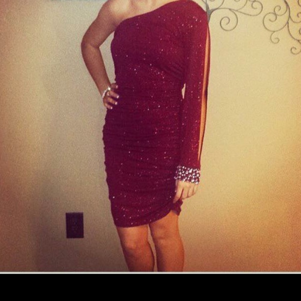 Red one shoulder cocktail dress.