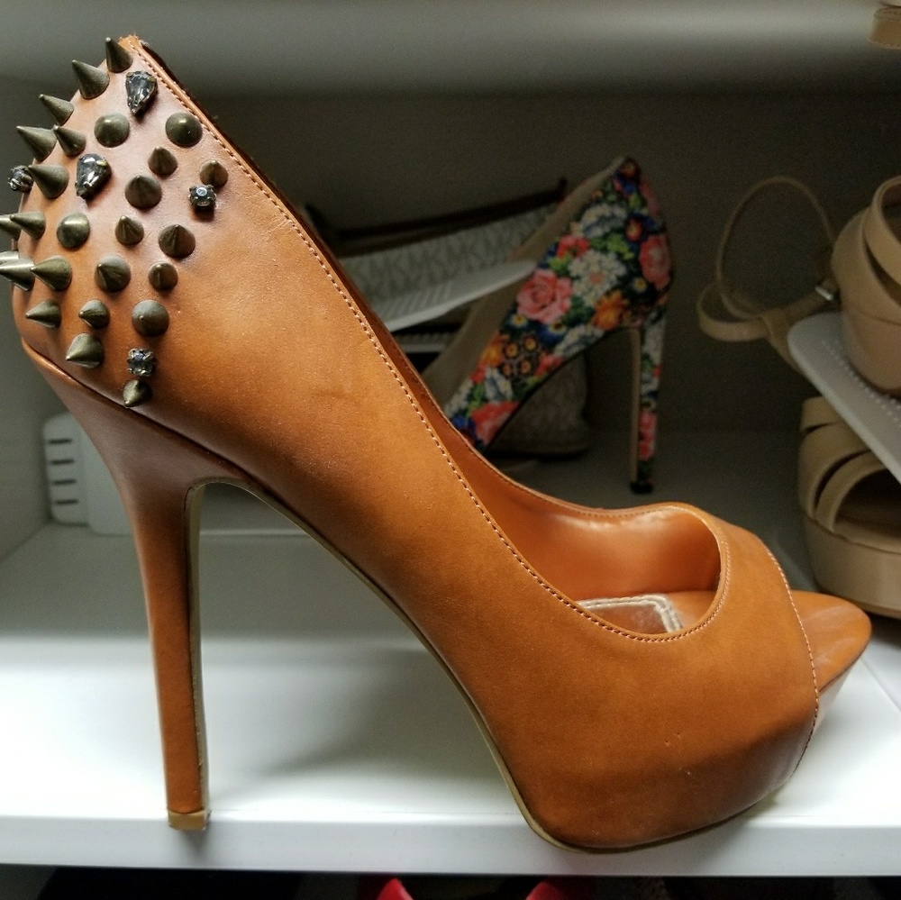 Spiked peep toe stiletto