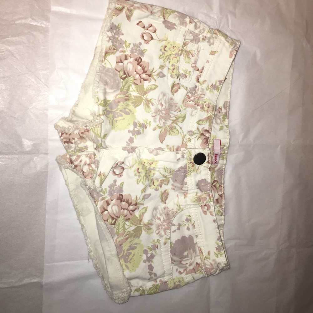 White and pink colored shorts