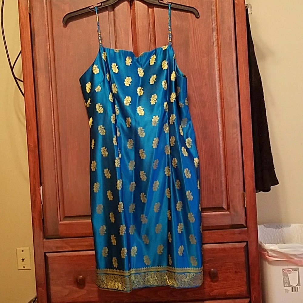 Teal/turquoise dress w gold print.GIORGIO FIORLINI