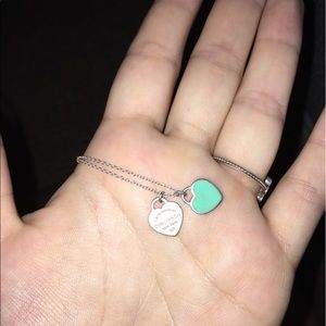 Authentic Tiffany necklace with blue heart.