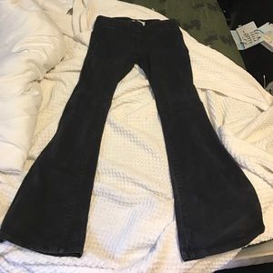 Free people stretchy bell bottom jeans.