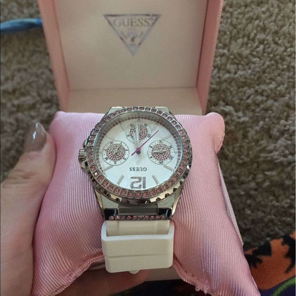 Pink and white watch never used comes with box