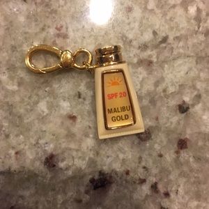 Juicy Couture gold charm
