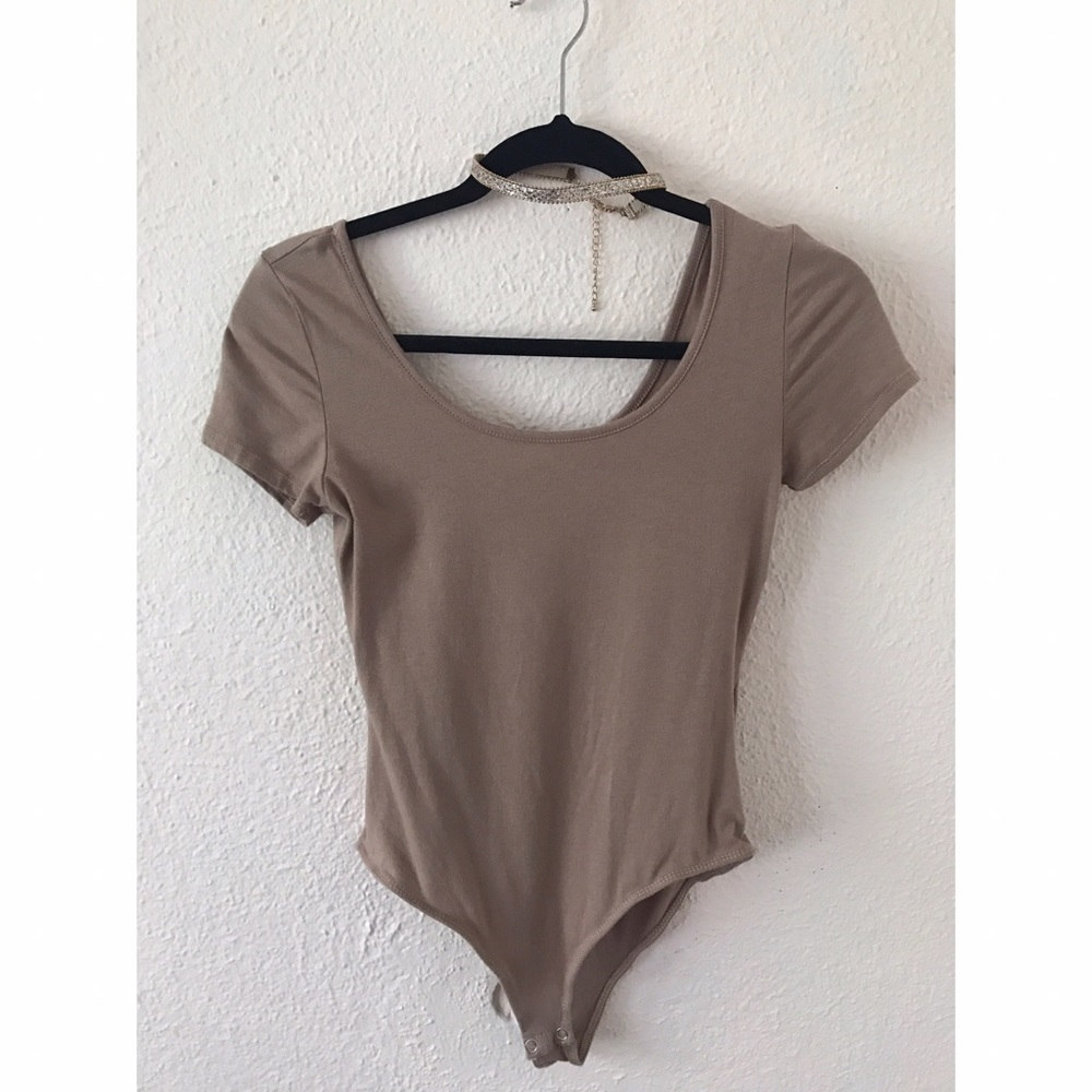 Brown body suit