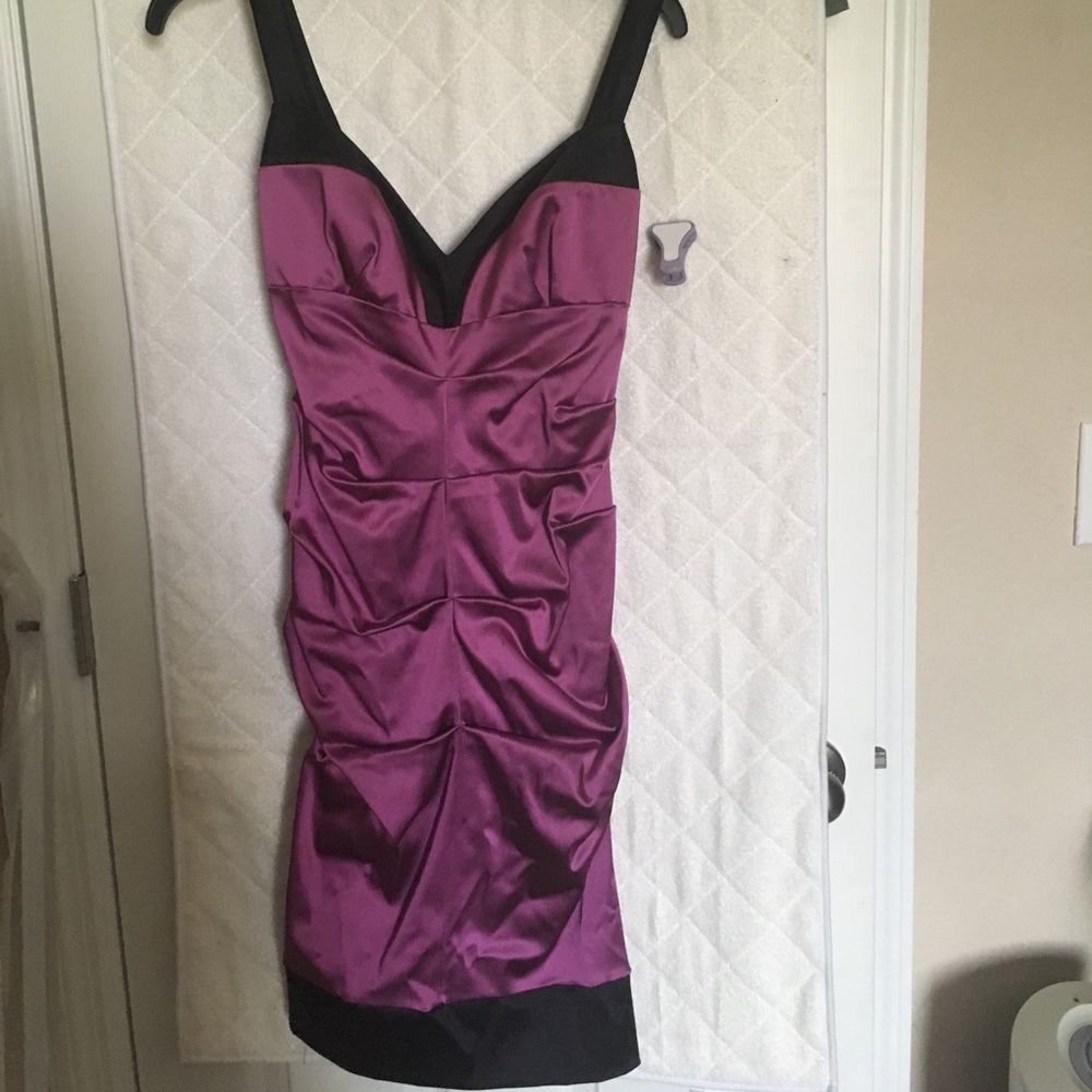 Nicole miller beautiful dress in a magenta color.