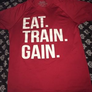 Eat, Train, Gain shirt.