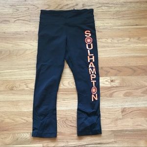 Black/orange Lululemon. soulcycle crop size 4