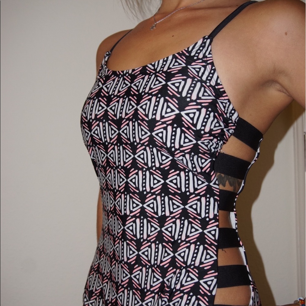SEXY geometric/tribal cut out one piece suit