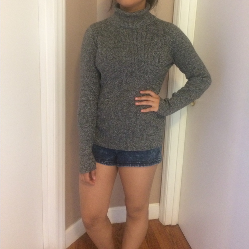 Kim Rogers grey turtle neck sweater