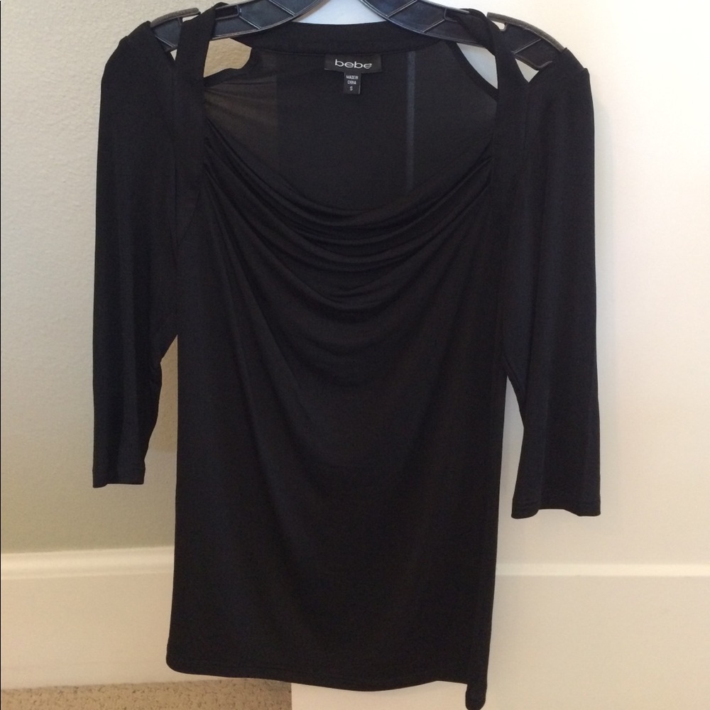 Bebe black blouse, with slight cutout shoulders