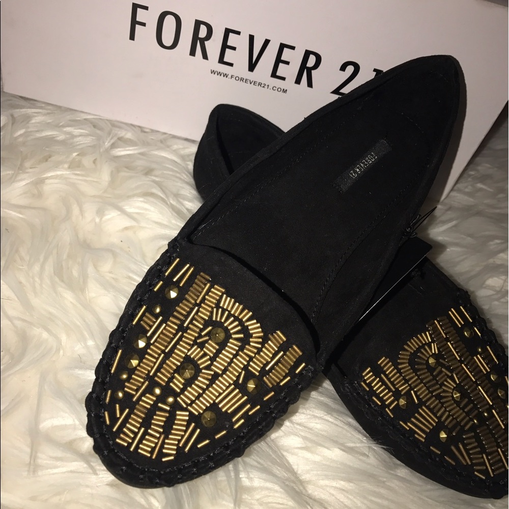 NWT black flats with gold detail